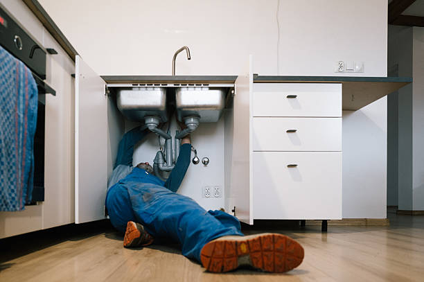 Professional Drain Cleaning technician working in Islandia, NY